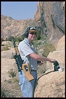 Chris loading his AK-47. When you absolutley, positively have to kill every last mother fucker in the room, except no substitutes. 